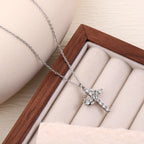 Rotating Crown Cross Necklace