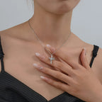 Rotating Crown Cross Necklace